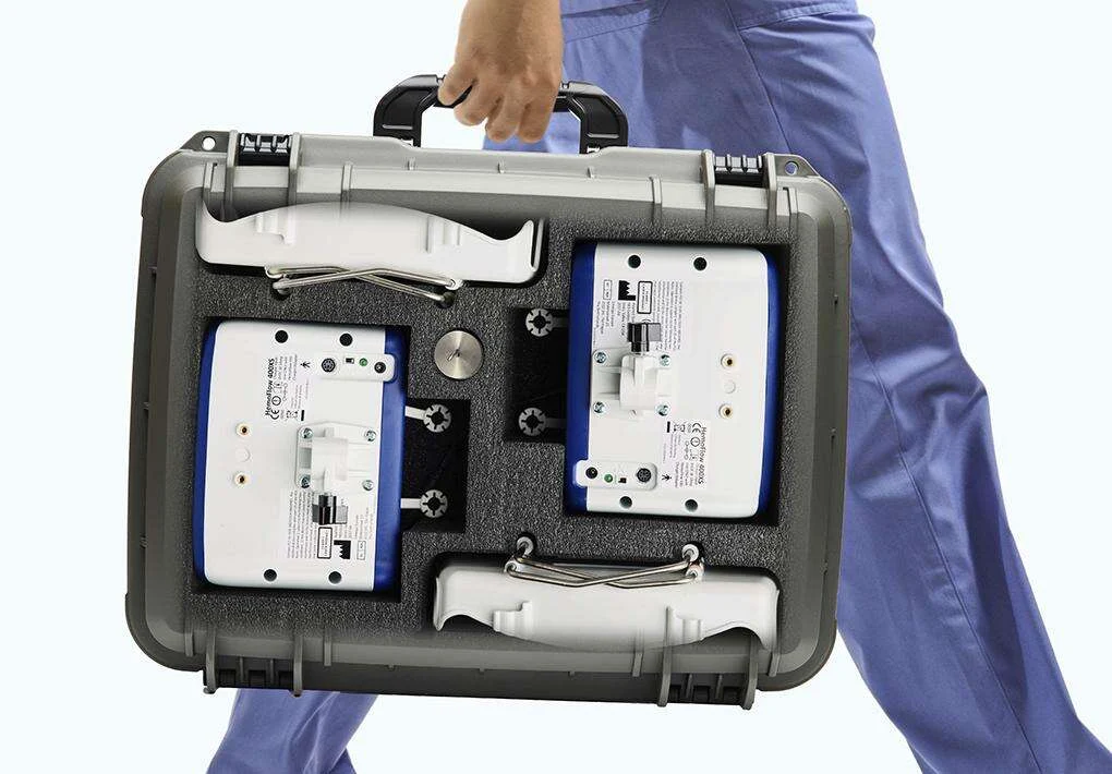 HemoFlow transport case holding two HemoFlow 400 devices with dual charging